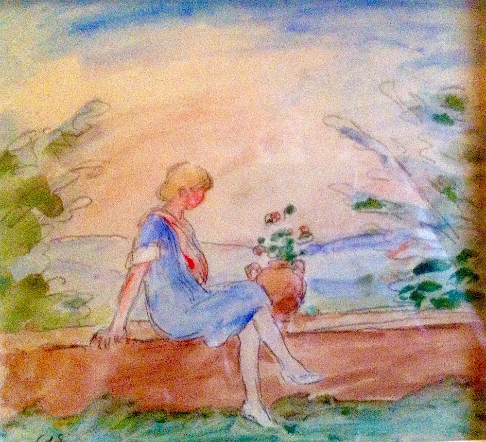Jeune fille assise dans un jardin